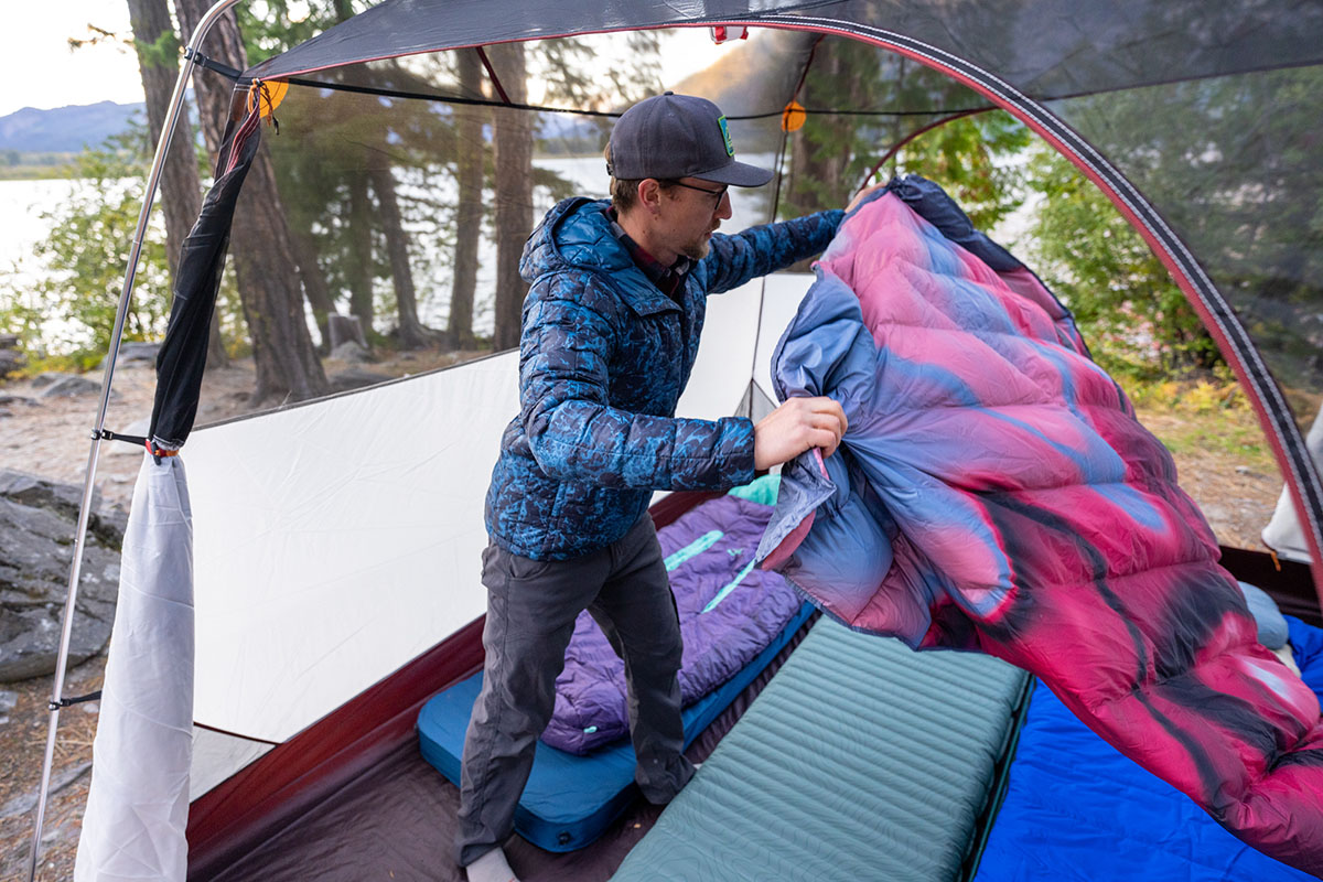 The North Face ThermoBall Eco Hoodie (setting up blanket inside tent)